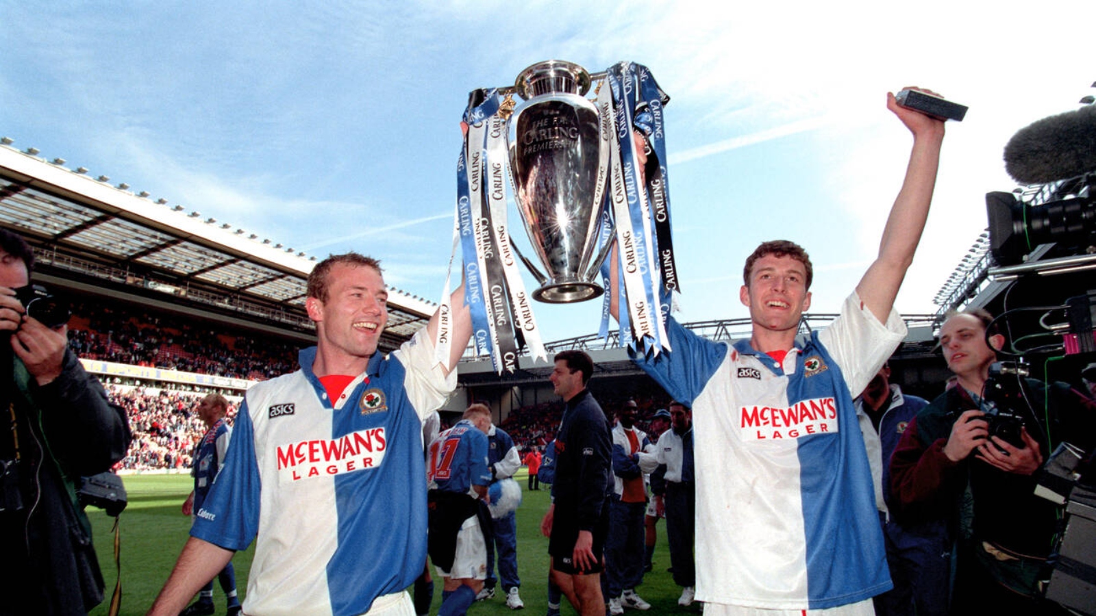 Blackburn Rovers' Alan Shearer and Chris Sutton celebrate with the FA Carling Premiership trophy