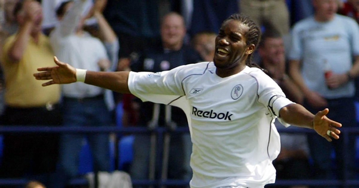 Bolton's Jay Jay Okocha celebrates scoring against Charlton in the Premiership at the Reebok Stadium, Bolton, Saturday August 14, 2004.