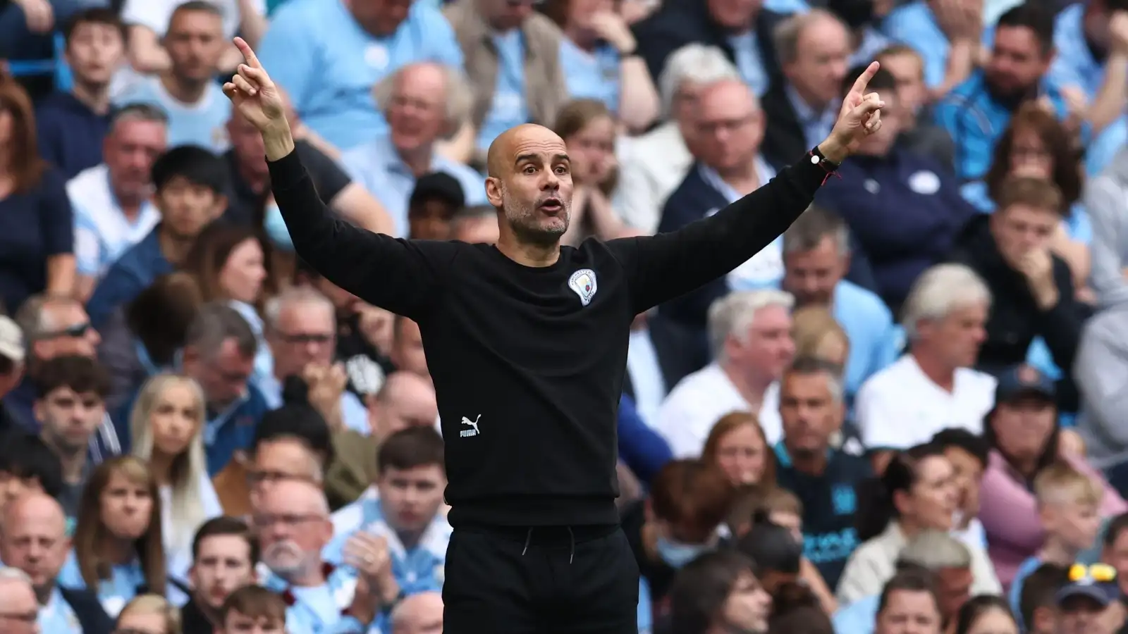 Pep Guardiola, manager of Manchester City, instructs his team during the Premier League final-day match against Aston Villa at the Etihad Stadium, Manchester, 22nd May, 2022.