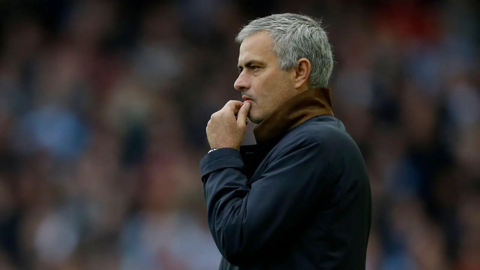 Chelsea's head coach Jose Mourinho gestures after his player Nemanja Matic was sent off for receiving a second yellow card during the English Premier League soccer match between West Ham and Chelsea at Upton Park stadium in London, Saturday, Oct. 24, 2015.