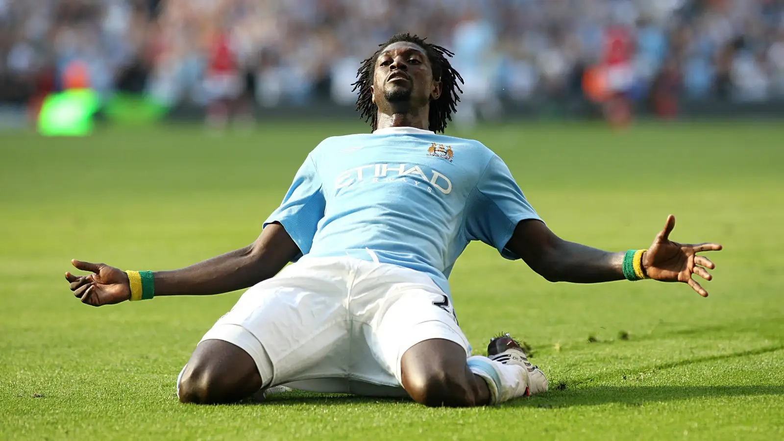 Emmanuel Adebayor celebrates scoring for Manchester City against Arsenal at Etihad Stadium, Manchester, September 2009.