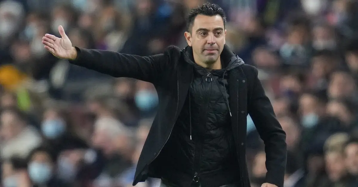 Barcelona head coach Xavi Hernandez stands on the touchline