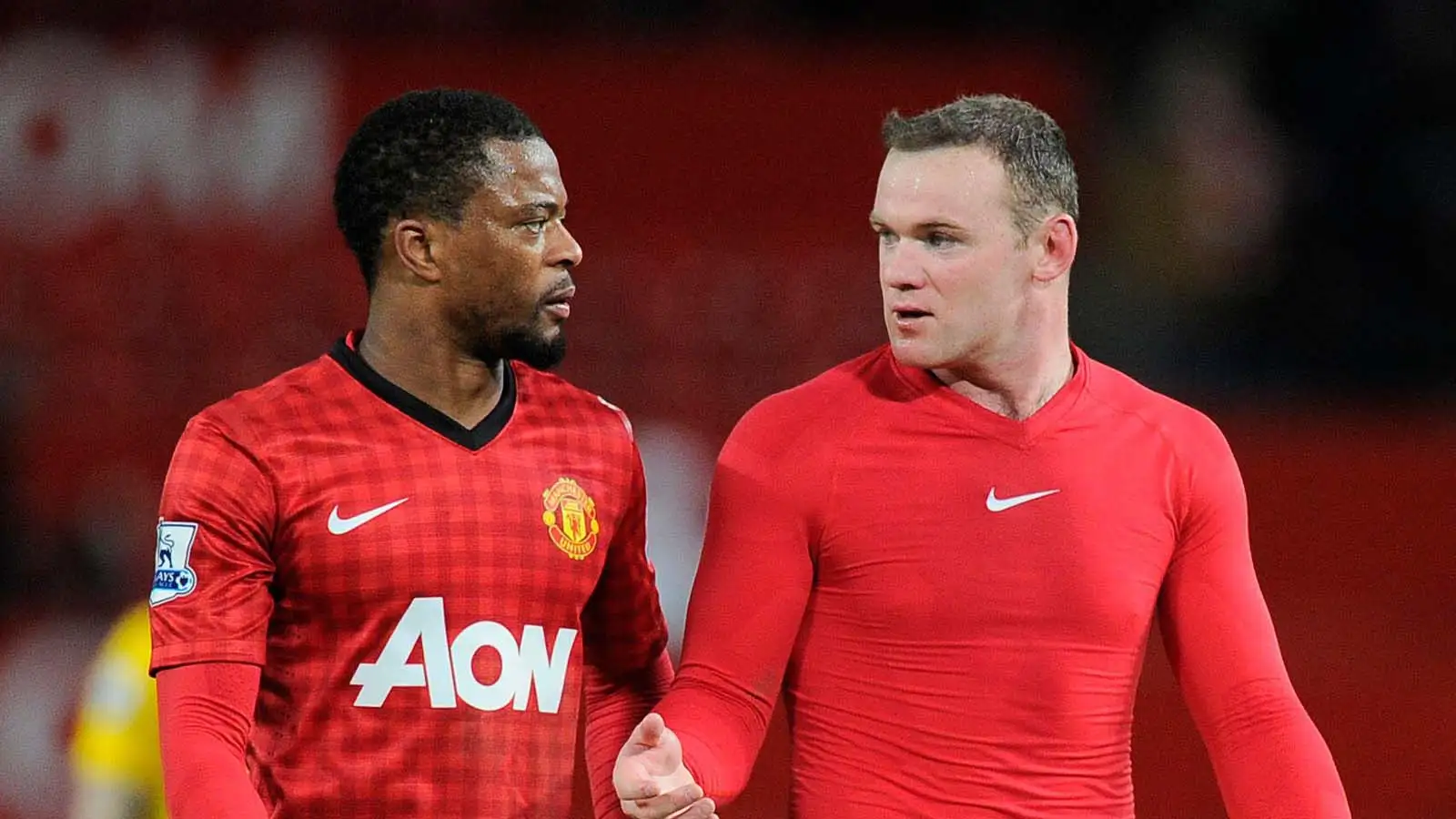 Patrice Evra and Wayne Rooney of Manchester United in 2013