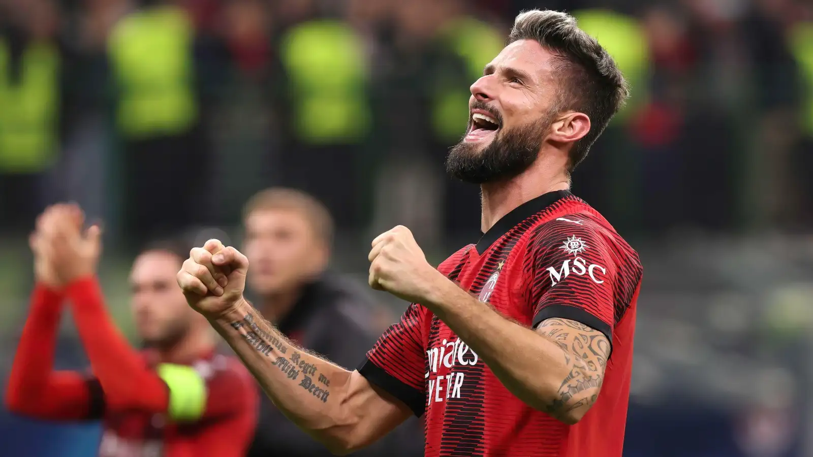 AC Milan's Olivier Giroud celebrates after their Champions League victory over PSG in November 2023.