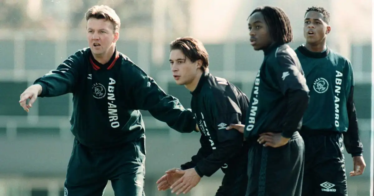 Ajax Training in Tokyo. Ajax Manager Louis Van Gaal gives out directions to Martijn Reuser, Kiki Masampa and Patrick Kluivert at the Nishigaoka Stadium, 26 November 1995